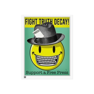 May include: A yellow smiley face wearing a black fedora with a "PRESS" note attached to the brim. The smiley face has a typewriter for a mouth and the text "FIGHT TRUTH DECAY!" and "Support a Free Press" in black and white.