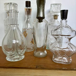 VINTAGE | assorted glass decanters | mid century bar decor | retro liquor bottles with stoppers | MCM scotch whiskey decanters