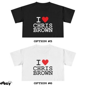 May include: Two cropped t-shirts, one black and one white, each with the text "I ❤️ CHRIS BROWN" in white and red. The shirts are short-sleeved and have a crew neck. The image also includes the text "OPTION #5" and "OPTION #6".
