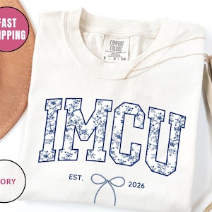 May include: A rustic wooden sign with the text "Welcome to our home" in white lettering. The sign features a distressed finish and a simple, inviting design, perfect for entryway decor.