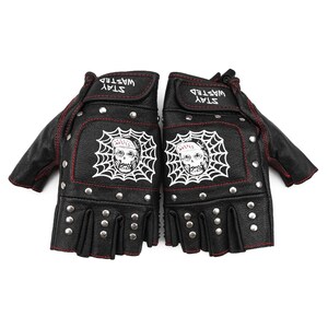 May include: Black leather fingerless gloves with a skull and spiderweb design. The gloves have silver studs and red stitching. The text "STAY WASTED" is written on the back of the gloves.