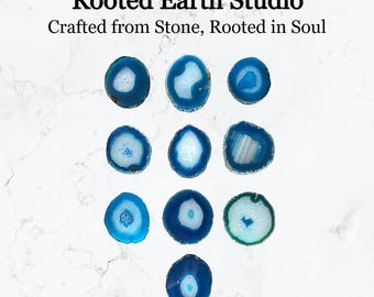 May include: Ten blue agate coasters with white and gray patterns. The coasters are round and have a polished finish. Rooted Earth Studio: Crafted from Stone, Rooted in Soul.