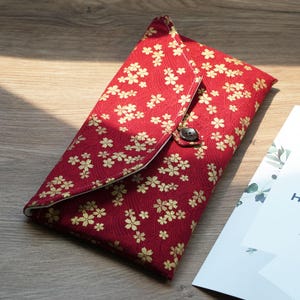 Custodia per Switch 2 con 6 slot per schede di gioco | Custodia in cotone fatta a mano | Design a forma di gatto Sakura dorato o limone | Regalo per gamer
