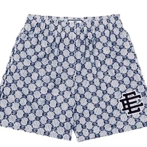May include: White and blue patterned shorts with a black and white "EE" logo on the right leg.