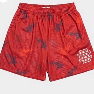 May include: Red mesh basketball shorts with a star pattern and a white "88" logo on the right leg.