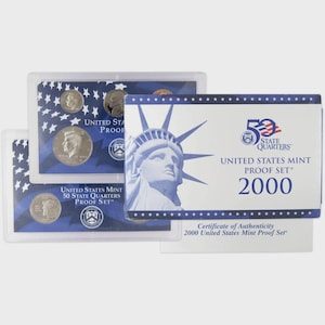 May include: A 2000 United States Mint Proof Set featuring 50 State Quarters. The set includes multiple coins in clear plastic cases, with a blue and white design. The packaging displays the Statue of Liberty and the text "50 State Quarters".