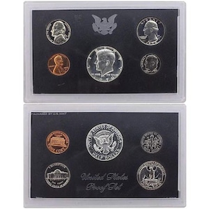 May include: Two clear plastic cases containing United States proof sets. Each set includes various coins, such as a penny, dime, quarter, and half-dollar, displayed on a black background. The text "United States Proof Set" is visible.
