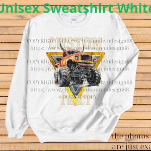 May include: White unisex sweatshirt with a graphic of a monster truck in orange, yellow, and black. The design includes the words "CUSTOM" and "TEXT" within a yellow triangle. The text "Unisex Sweatshirt White" is at the top.