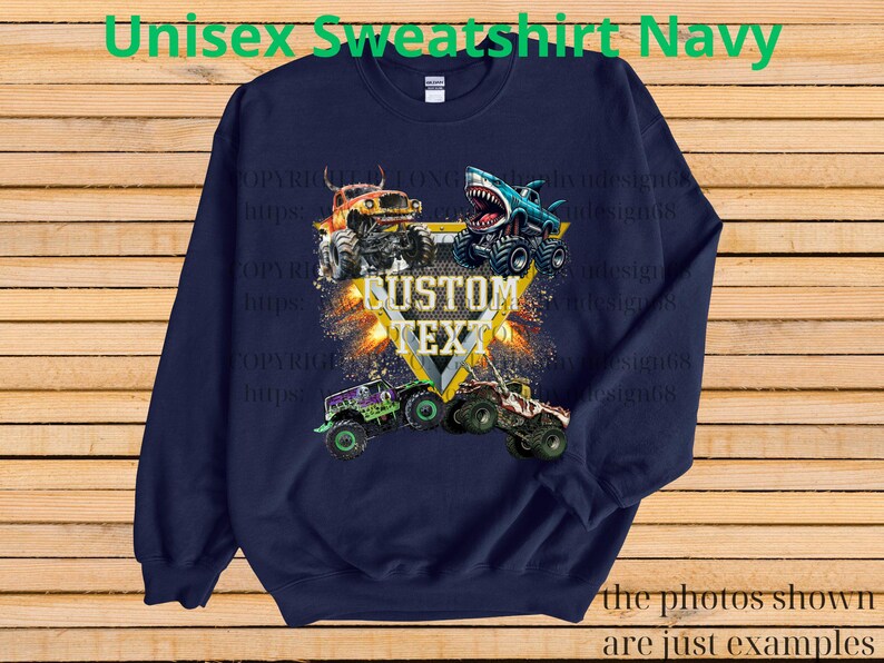 May include: Navy blue unisex sweatshirt featuring a graphic of four monster trucks with the text "CUSTOM TEXT". The sweatshirt has the text "Unisex Sweatshirt Navy" at the top and "the photos shown are just examples" at the bottom.
