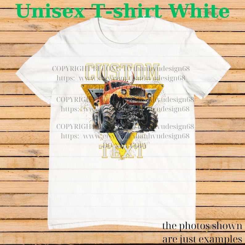 May include: White unisex t-shirt featuring a colorful monster truck design. The graphic includes a yellow triangle with the word "CUSTOM" and "TEXT". The shirt also has text that says "Unisex T-shirt White".