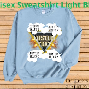 May include: Light blue unisex sweatshirt with a custom text design. The design features a yellow triangle with the words "CUSTOM TEXT" and four areas for custom truck names. The text "Unisex Sweatshirt Light Blue" is at the top.
