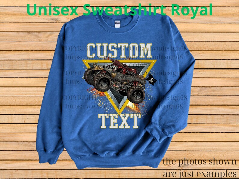 May include: Royal blue unisex sweatshirt with a custom design. The design features a monster truck graphic with the words "CUSTOM TEXT" in white. The sweatshirt has the text "Unisex Sweatshirt Royal" at the top.