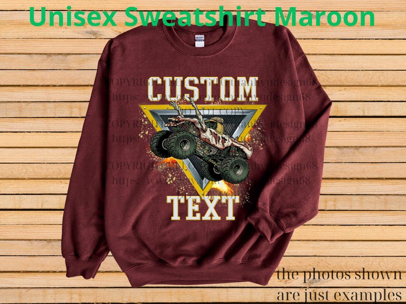 May include: Maroon unisex sweatshirt with a custom design. The design features a monster truck graphic inside a yellow triangle, with the words "CUSTOM" and "TEXT". The text "the photos shown are just examples" is at the bottom.