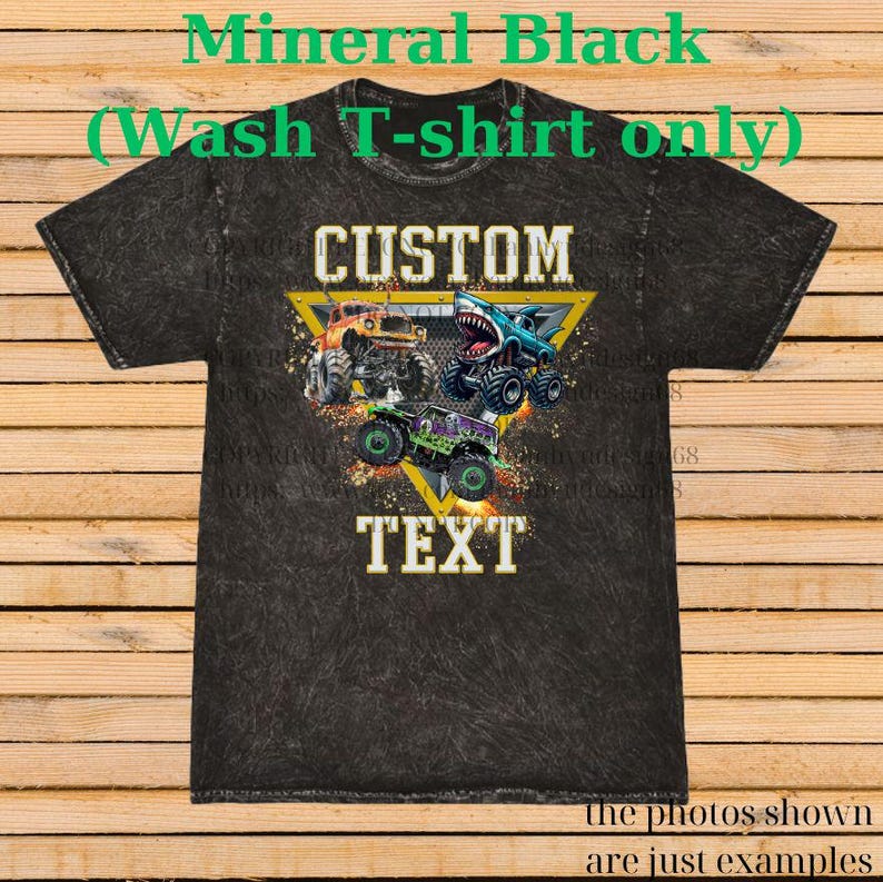 May include: A black mineral wash t-shirt featuring a graphic of three monster trucks inside a yellow triangle. The word "CUSTOM" is above the trucks, and "TEXT" is below. The shirt has the text "Mineral Black (Wash T-shirt only)" at the top.