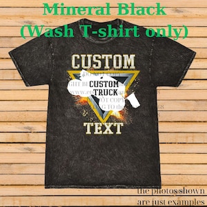 May include: Mineral black wash T-shirt with a custom design. The design features the word "CUSTOM" above a yellow and black triangle with the words "CUSTOM TRUCK" inside. The word "TEXT" is below the triangle.