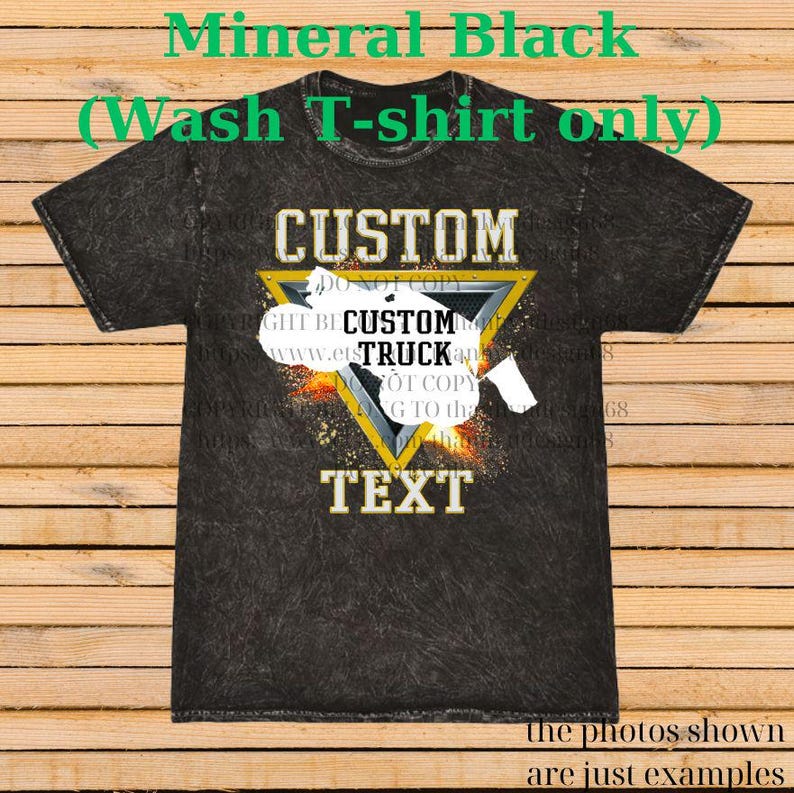 May include: Mineral black wash T-shirt with a custom design. The design features the word "CUSTOM" above a yellow and black triangle with the words "CUSTOM TRUCK" inside. The word "TEXT" is below the triangle.
