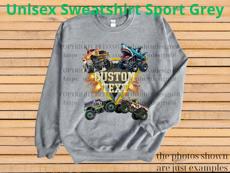 May include: A gray unisex sweatshirt with a graphic of four monster trucks in various colors. The text "CUSTOM TEXT" is in the center. The words "Unisex Sweatshirt Sport Grey" are at the top.