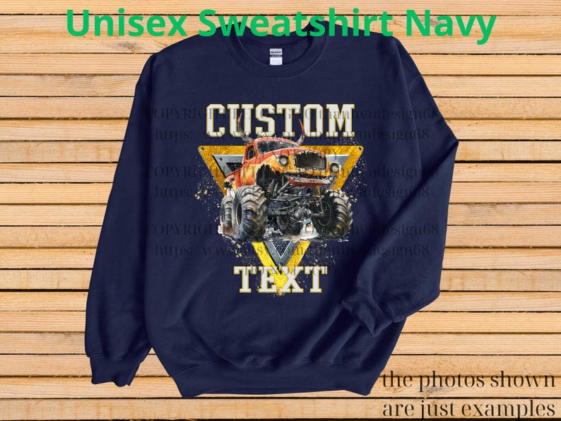 May include: Navy blue unisex sweatshirt with a graphic of a monster truck inside a yellow triangle. The words "CUSTOM" and "TEXT" are above and below the truck. The sweatshirt has the text "Unisex Sweatshirt Navy" at the top.