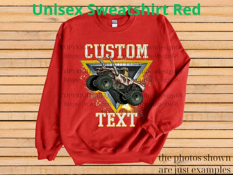 May include: A red unisex sweatshirt featuring a monster truck graphic within a yellow and grey triangle. The words "CUSTOM" and "TEXT" are displayed above and below the truck image. The text "Unisex Sweatshirt Red" is at the top.