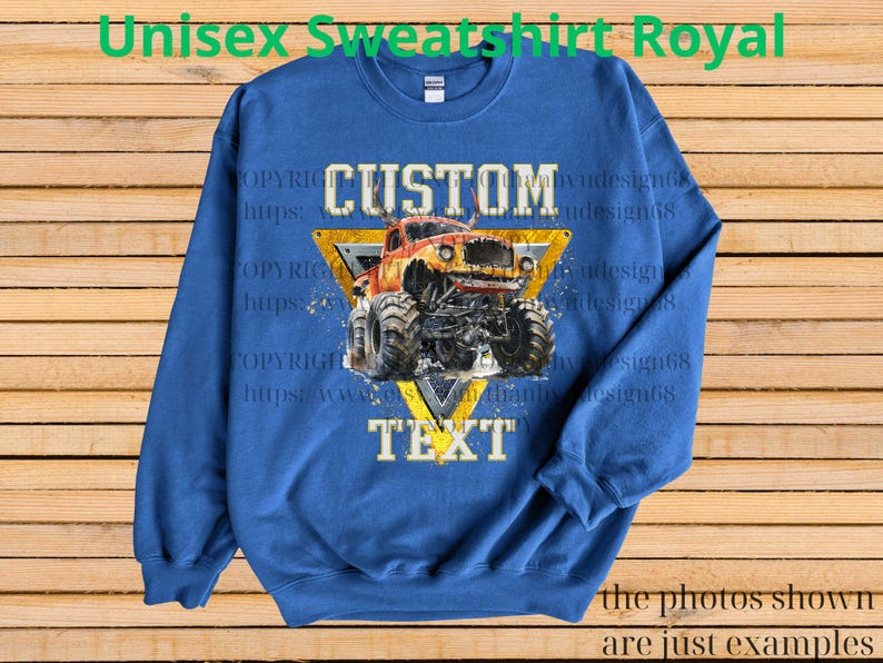May include: Royal blue unisex sweatshirt with a custom monster truck design. The design features a yellow triangle with the words "CUSTOM" and "TEXT" and a detailed illustration of a monster truck. The text "Unisex Sweatshirt Royal" is at the top.