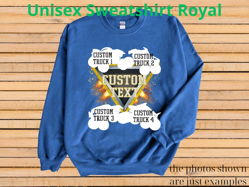 May include: Royal blue unisex sweatshirt with a custom text design. The design features a yellow triangle with the words "CUSTOM TEXT" and four white truck graphics. The text "Unisex Sweatshirt Royal" is at the top.