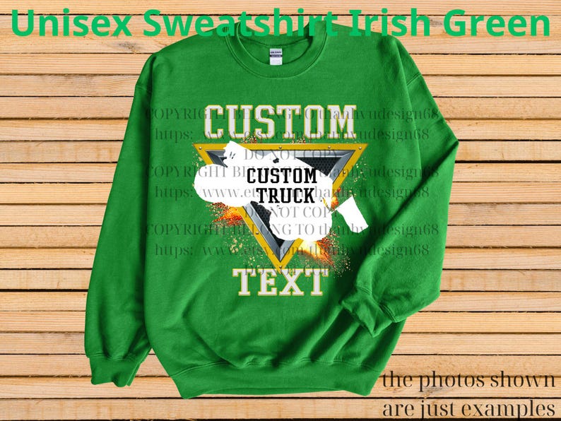 May include: A green unisex sweatshirt with a custom truck design. The design includes a yellow triangle with the words "CUSTOM TRUCK TEXT" in white. The sweatshirt has long sleeves and a crew neck.