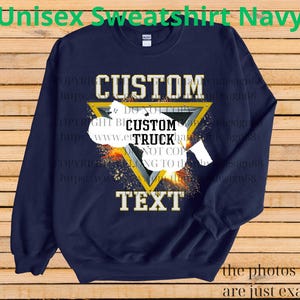 May include: Navy blue unisex sweatshirt with a custom design. The design features the word "CUSTOM" above a yellow triangle with a truck graphic and the word "TEXT" below. The sweatshirt has the text "Unisex Sweatshirt Navy" at the top.