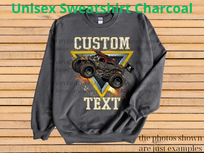 May include: Charcoal gray unisex sweatshirt featuring a custom design. The design includes a monster truck graphic within a yellow triangle, with the words "CUSTOM TEXT" in white. The sweatshirt has a crew neck and long sleeves.