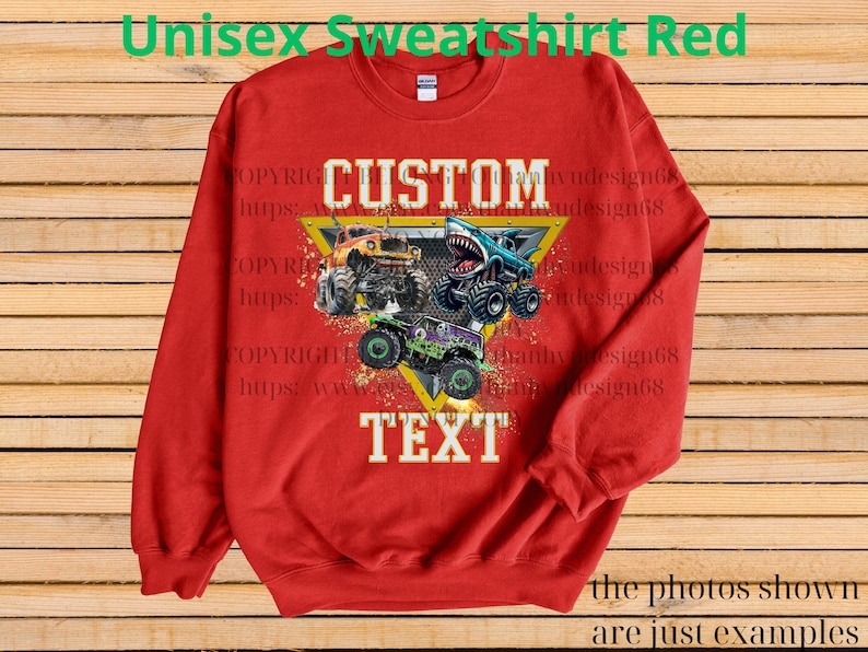 May include: Red unisex sweatshirt with a graphic of three monster trucks. The sweatshirt has the words "CUSTOM TEXT" in white block letters. The top of the sweatshirt has the words "Unisex Sweatshirt Red" in green.