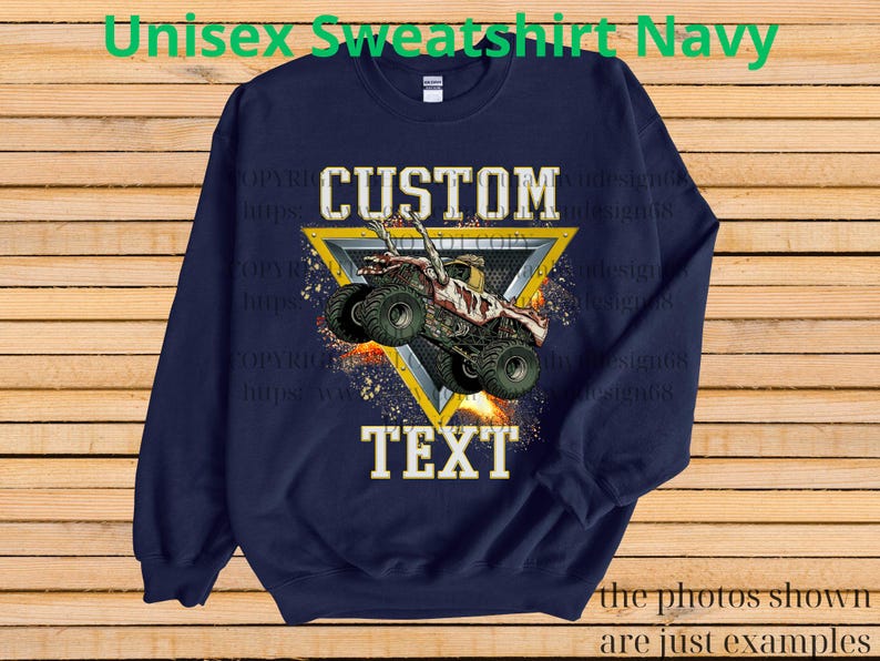 May include: Navy blue unisex sweatshirt with a custom design. The design features a monster truck inside a yellow triangle, with the words "CUSTOM" and "TEXT" in white. The sweatshirt has long sleeves and a crew neck.