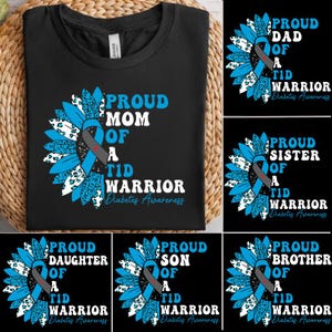 May include: Black t-shirt with a sunflower design and the text "PROUD MOM OF A TID WARRIOR Diabetes Awareness." Additional shirts feature similar designs with "DAD," "SISTER," "DAUGHTER," "SON," and "BROTHER" variations.