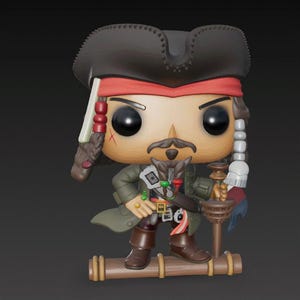 May include: A Funko Pop! vinyl figure of Captain Jack Sparrow from the Pirates of the Caribbean film series. The figure is wearing a black tricorn hat, red bandana, and a green coat. It stands on a wooden base and holds a staff.