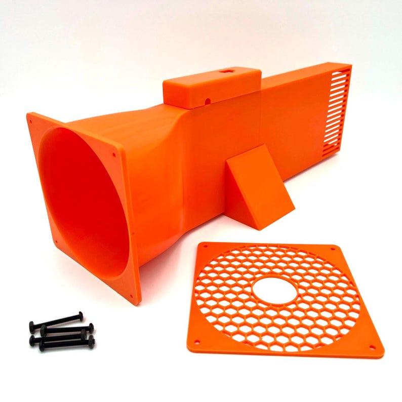Peut inclure: Un objet orange en plastique en forme d'entonnoir avec une extension rectangulaire et une pi&egrave;ce carr&eacute;e s&eacute;par&eacute;e &agrave; motif en nid d'abeille. Comprend un ensemble de vis noires. L'objet a une conception en forme d'&eacute;vent &agrave; une extr&eacute;mit&eacute;.