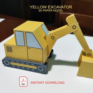 May include: A yellow excavator 3D paper model featuring a cab with light blue windows, a mechanical arm, and dark gray tracks. The text "YELLOW EXCAVATOR 3D PAPER MODEL" appears at the top, and a red "PDF INSTANT DOWNLOAD" icon is at the bottom.