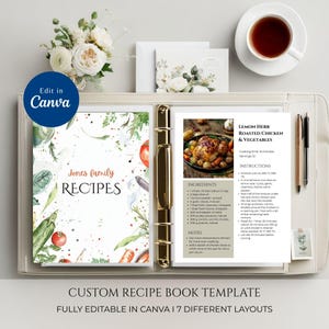 May include: A custom recipe book template with a light-colored leather binder. The book features a floral design and the text "Jones family RECIPES". A recipe for Lemon Herb Roasted Chicken & Vegetables is displayed. The text "Edit in Canva" is visible.