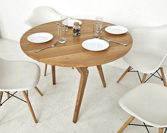 2-in-1 Round Oak Transformer Table: Adjustable Height Coffee/Dining Table