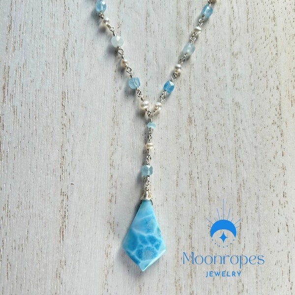 16-18” Sterling silver drop necklace with exquisite kite-shaped larimar pendant. Roasary chain w/ aquamarine and freshwater pearl.