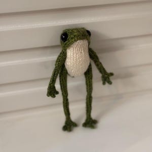 Amigurumi-kikker, schattige groene kikker