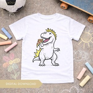 May include: White t-shirt featuring a cartoon dinosaur eating pizza. The dinosaur is white with yellow accents. The shirt has a crew neck and short sleeves. The words "DIGITAL DOWNLOAD" are printed on a tan banner.