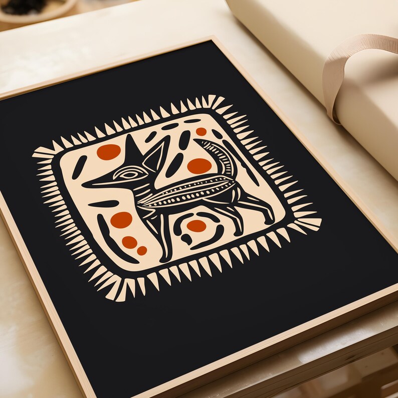 May include: A black and white illustration of a stylized dog with orange and white accents. The dog is surrounded by a white frame with a geometric pattern.