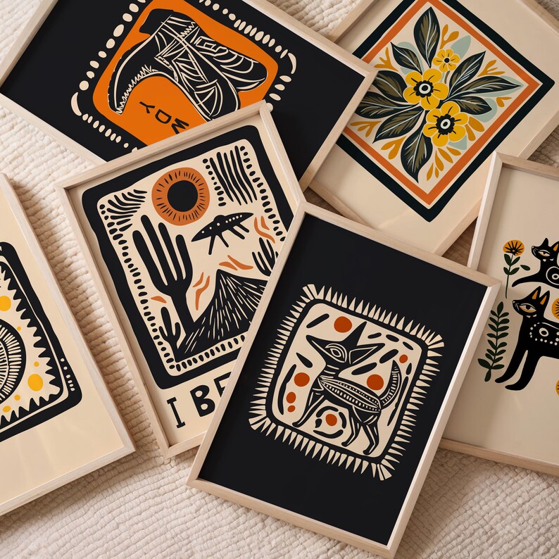 May include: Set of six framed prints with black backgrounds and colorful illustrations. The prints feature a variety of designs, including a cactus, a mountain, a fox, and a bird. The frames are made of wood and have a natural finish.