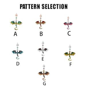May include: Image shows seven dragon-shaped pendants in various colors, including green, red, and blue. Each pendant is suspended from a decorative top. The text "PATTERN SELECTION" is at the top of the image, with each pendant labeled with a letter.