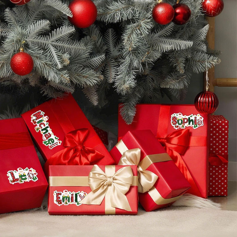 May include: Red wrapped Christmas gifts with gold and red bows are arranged under a decorated Christmas tree. Each gift has a name sticker: Michael, Emily, Sophia, and Leo. Red ornaments hang from the tree.