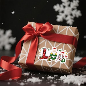 May include: A wrapped gift box with a red ribbon and bow. The box is covered in brown paper with a white geometric pattern. A sticker on the box says "Leo" with Christmas-themed illustrations, including Santa Claus and a Christmas tree.