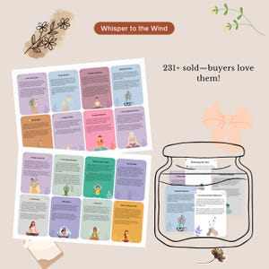 May include: A selection of colourful cards featuring yoga poses and text, presented with a glass jar and a decorative bow. The cards are labelled with phrases such as "Mountain Breeze" and "Cherry Blossom Dream". The text "Whisper to the Wind" is also visible.