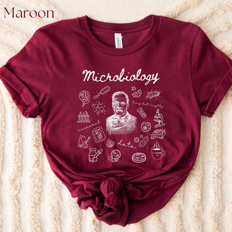 Pay tribute to the roots of microbiology with this Louis Pasteur Microbiology Doodle Shirt or Sweatshirt, featuring the word “Microbiology” surrounded by playful doodles of petri dishes, microbes, flasks, and more. Inspired by Pasteur—the father of microbiology—this design is perfect for scientists, lab techs, students, and anyone proud of science history.