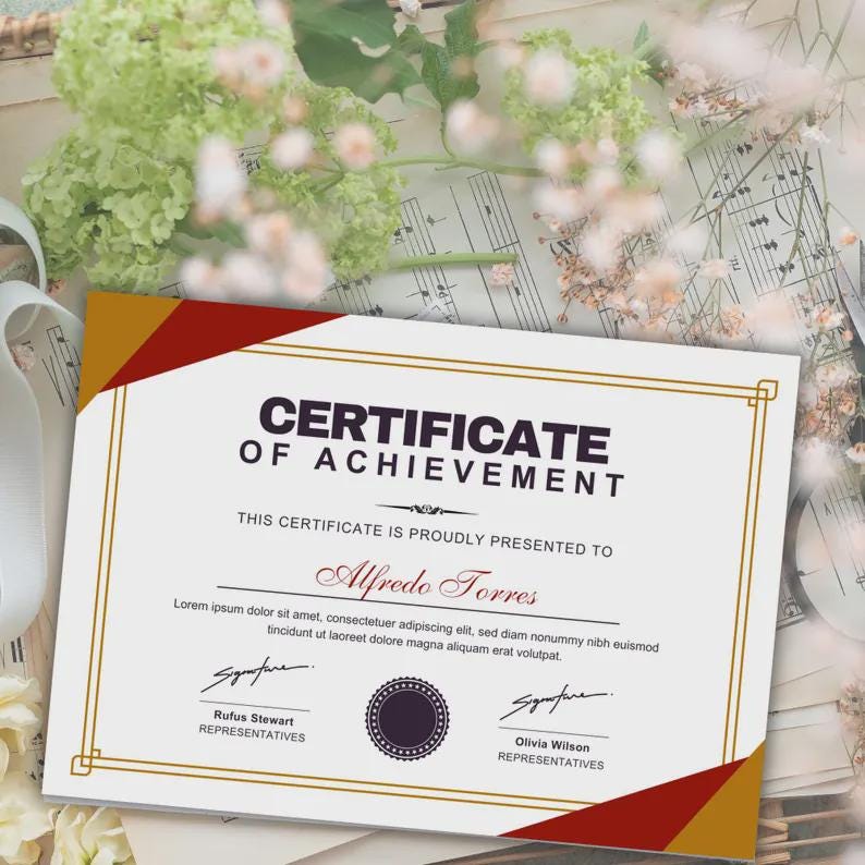 May include: A formal certificate of achievement with gold borders and red and gold accents. The certificate includes the text "CERTIFICATE OF ACHIEVEMENT" and the name "Alfredo Torres". Signatures and representative titles are also included.