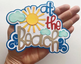 Beach Scrapbook embellishment at the beach title. Summer beach theme. A premade paper piecing for scrapbook layouts by my tear bears kira