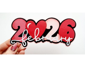 Adorno de febrero de 2026. Título del álbum de recortes: tema 2026. Diseño de papel personalizado para álbumes de recortes realizado por My Tear Bears Kira.
