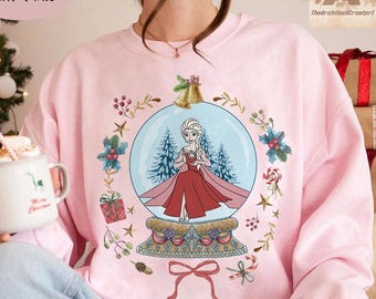 Camiseta navideña de Frozen de Disney, sudadera navideña de Elsa con bola de nieve, camiseta navideña de Disney, fiesta navideña de Disney, camiseta navideña de viaje de chicas a Disneyland